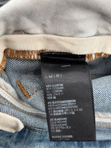 Amiri Staggered Logo Distressed Jeans