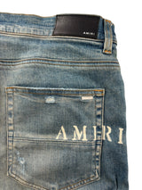 Amiri Hibiscus Floral Print Skinny Jeans