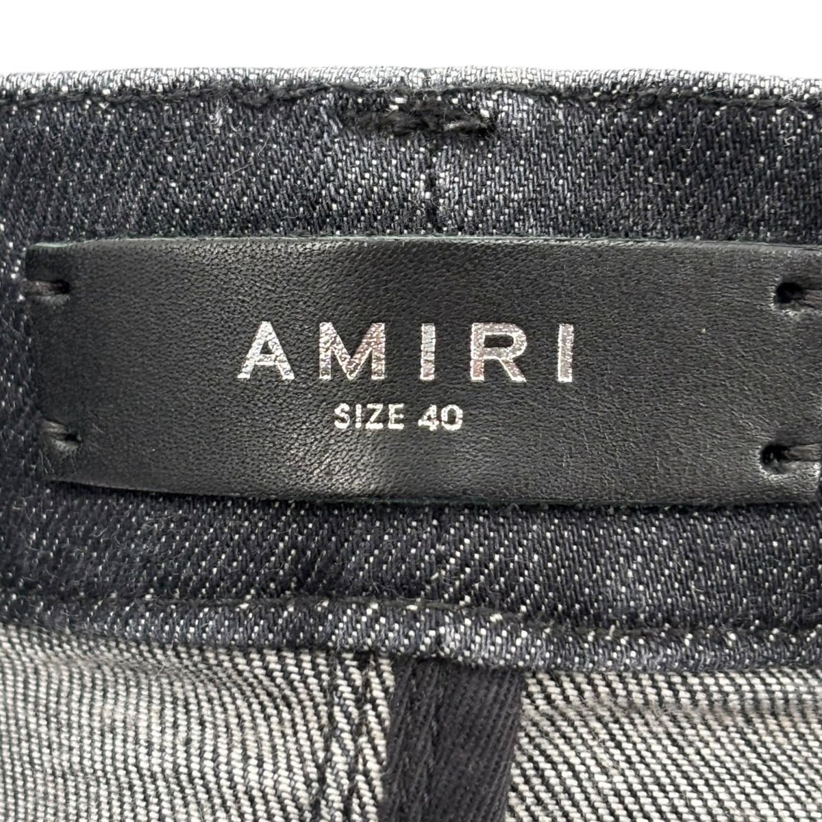 Amiri Staggered Logo Distressed Skinny Jeans
